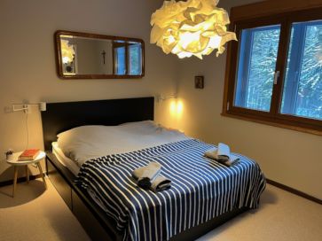 Large king's size bed in the master bedroom